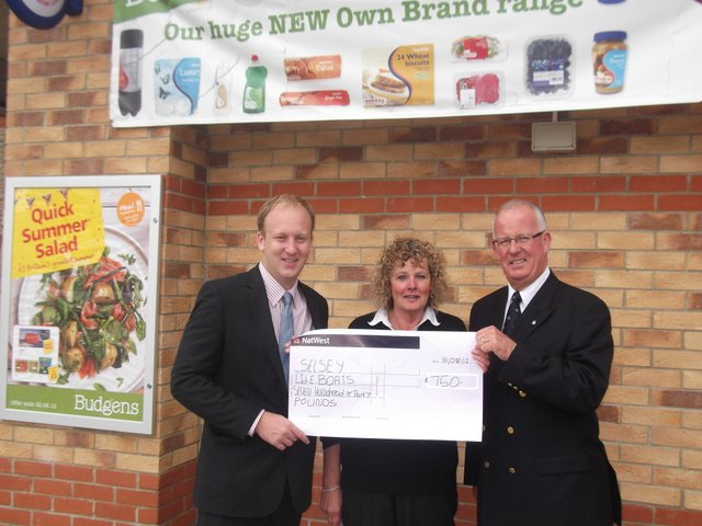 Budgen's cheque presentation