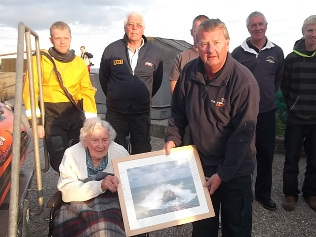 Muriel being presented with the framed photo