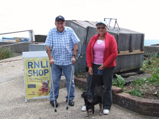 Reg on his mobility scooter outside the inshore lifeboat shed